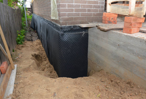 SJ Waterproofing Pros technician performing targeted Waterproofing assessment in Folsom, PA